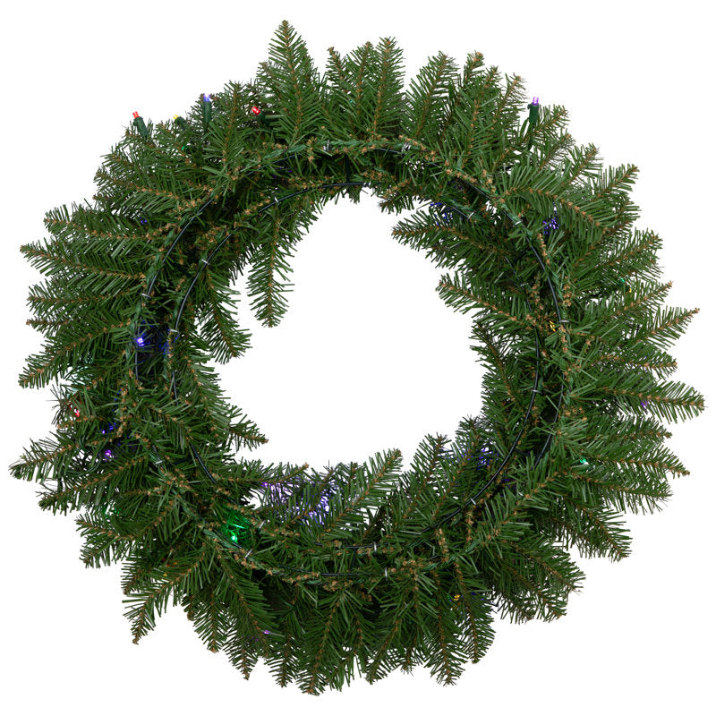 24" Pre-Lit Artificial Pine Christmas Wreath hanging on a front door