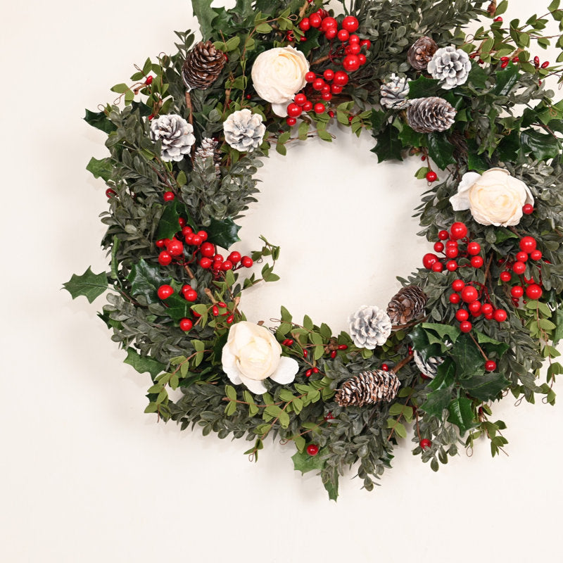 24" frosted Christmas wreath with pinecones and red berries