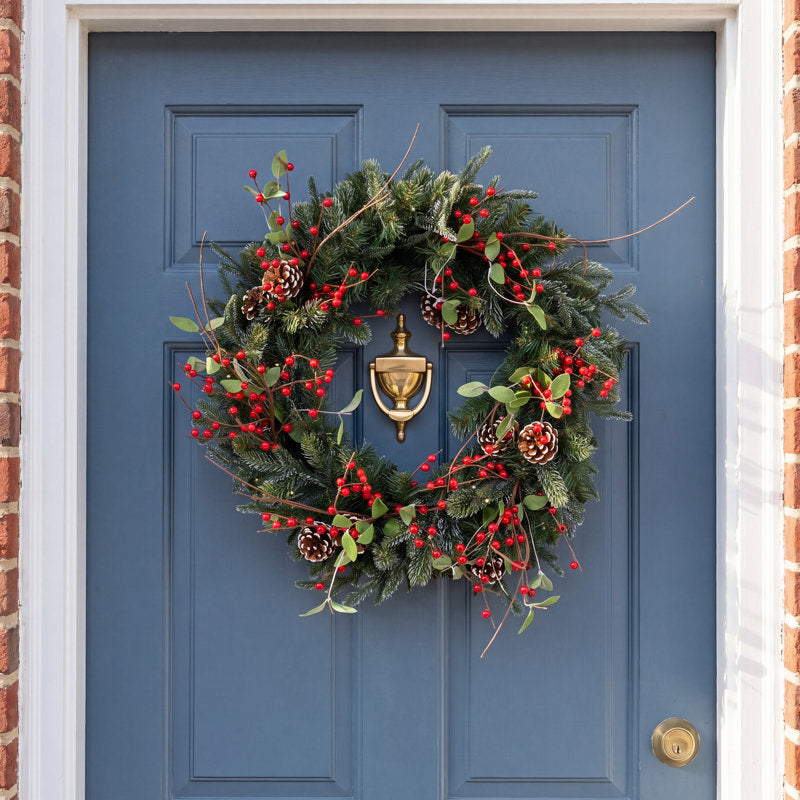 26" Artificial Cedar Christmas Wreath displayed on a front door