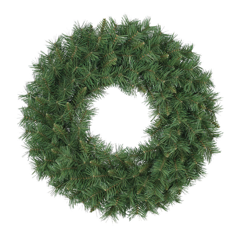 24" Artificial Pine Christmas Wreath hung on a wooden door