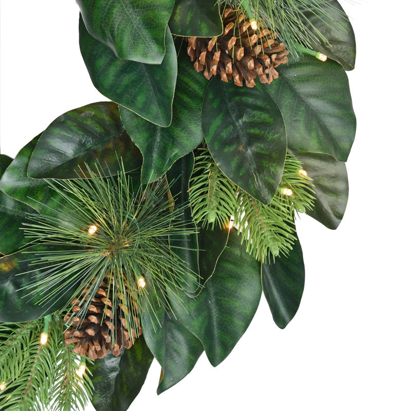 24" Artificial Christmas Wreath as a festive door display