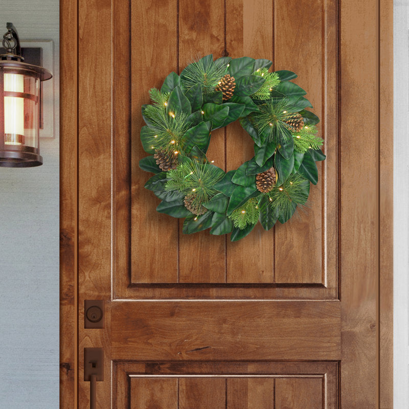 24" Artificial Christmas Wreath as a festive door display