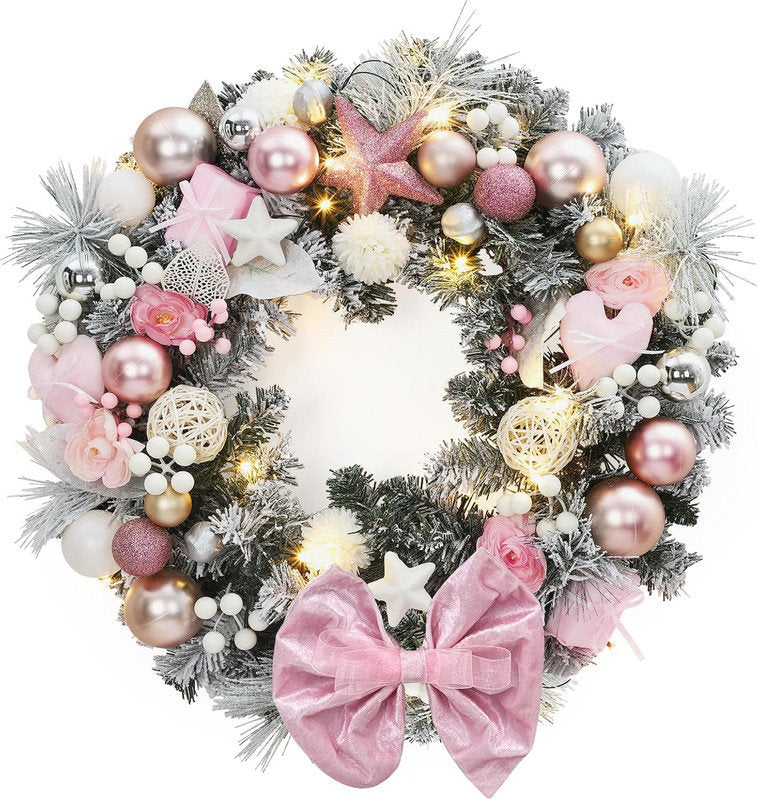 24" Pre-Lit Frosted Pine Christmas Wreath hung on a wooden door