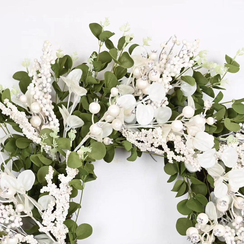 Boxwood Christmas Wreath displayed on a front door