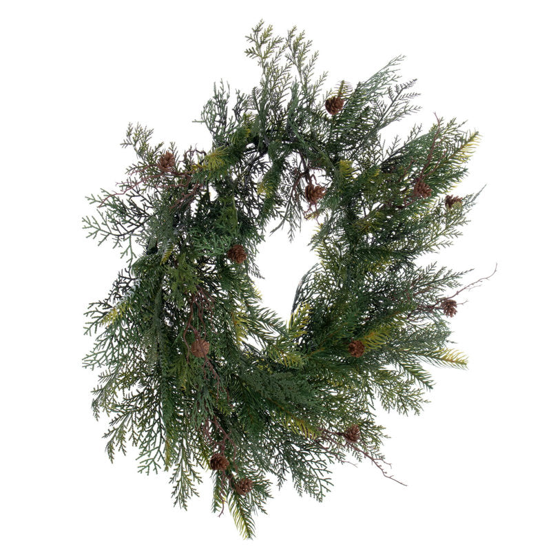 26" Cedar Christmas Wreath hanging on a front door