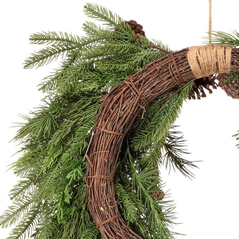 Artificial Christmas Wreath displayed on a front door