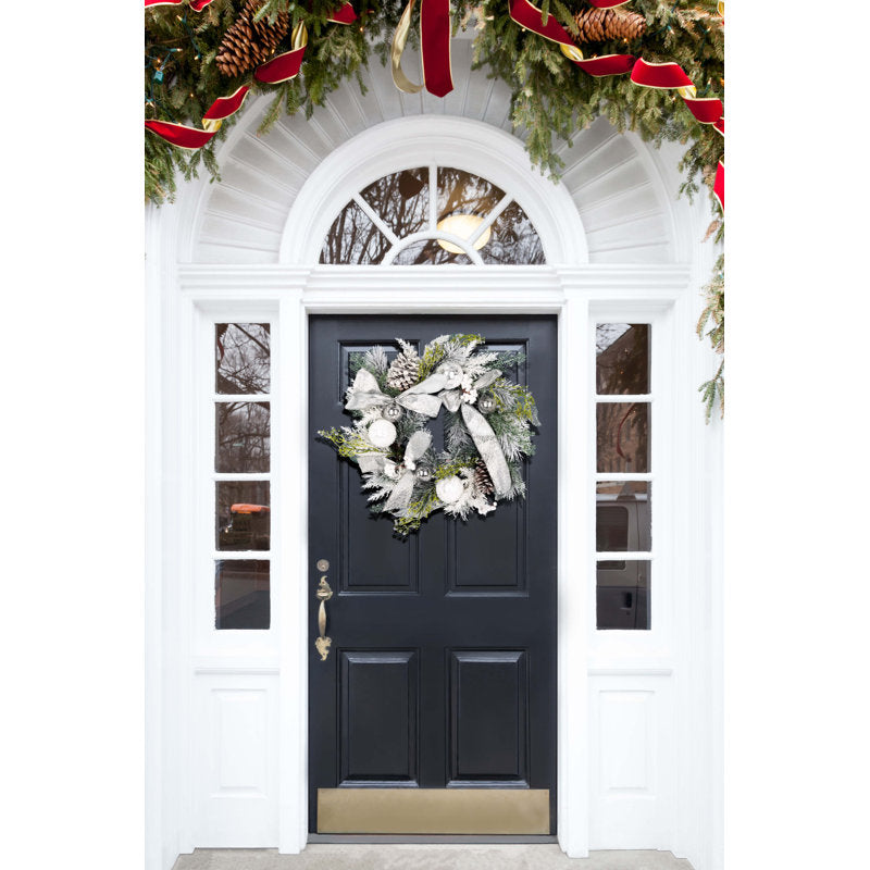 27.5" Fir Christmas Wreath hanging on a front door