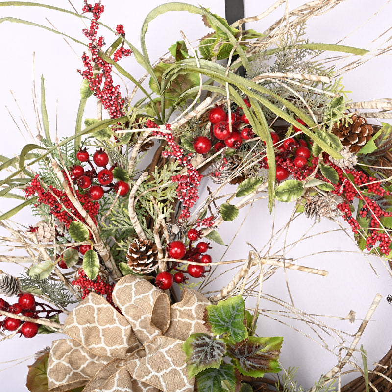 24" Pre-Lit Artificial Fir Christmas Wreath hung on a wooden door