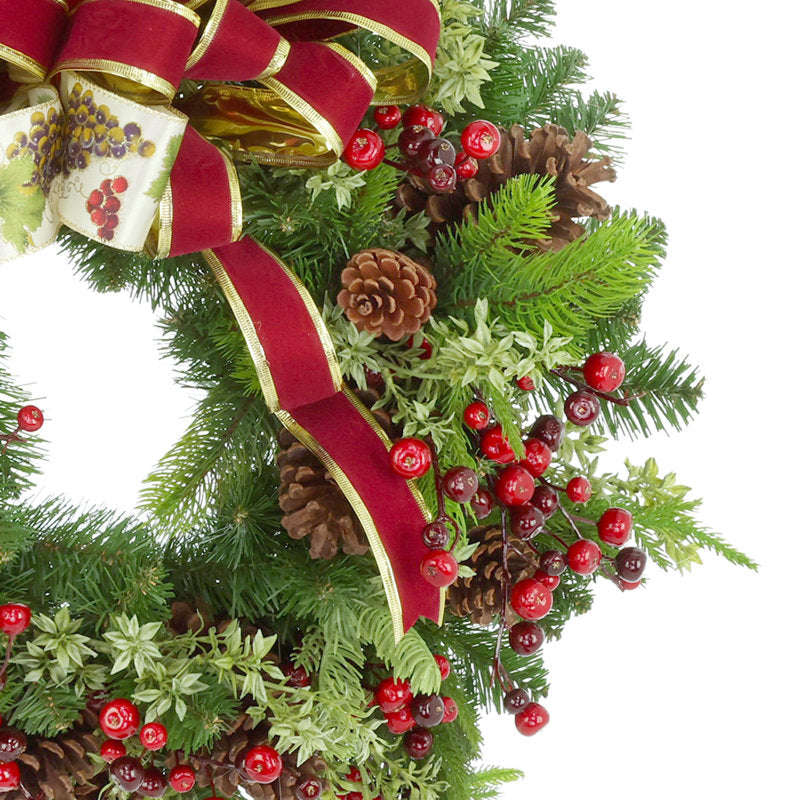24" Christmas Wreath displayed on a front door