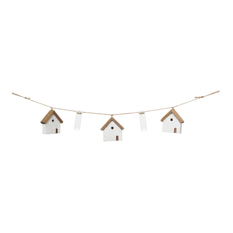 5 ft Artificial Berry Christmas Garland styled along a festive mantel