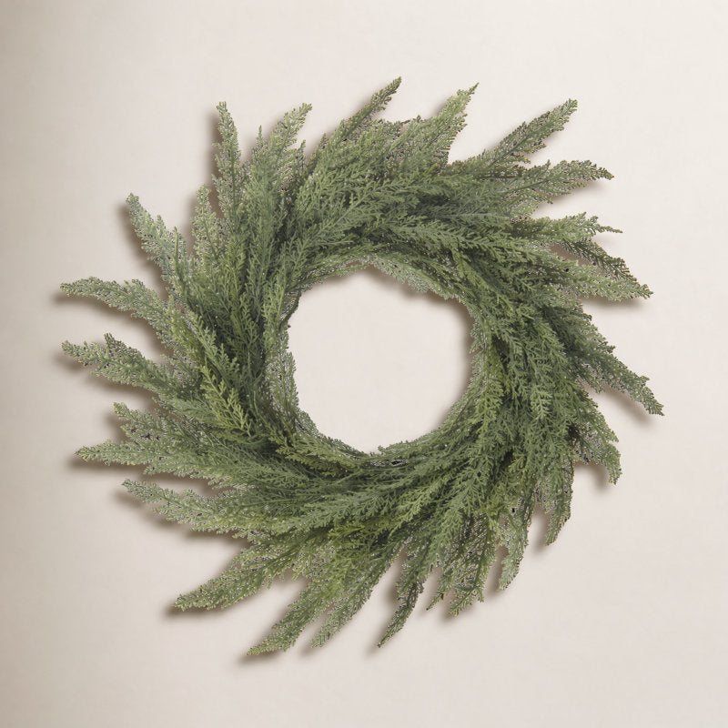 0.4" Artificial Christmas Wreath hanging on a front door