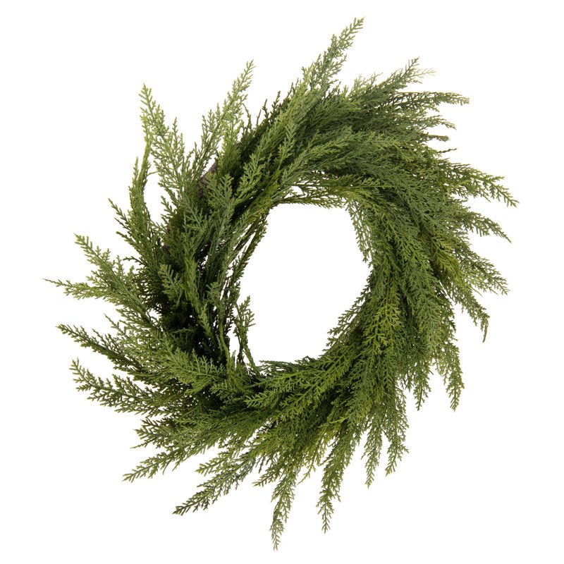 0.4" Artificial Christmas Wreath hanging on a front door