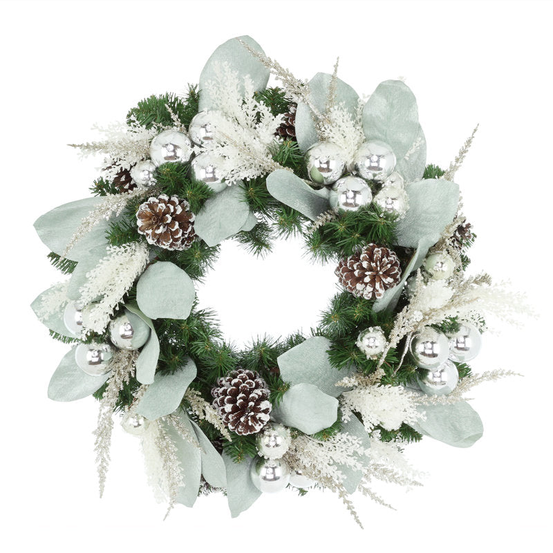 28" Pine Christmas Wreath hanging on a front door