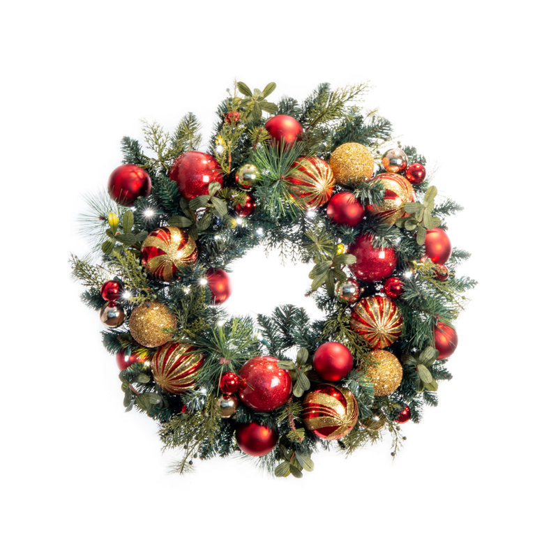 26" Glitter Christmas Wreath hung on a wooden door