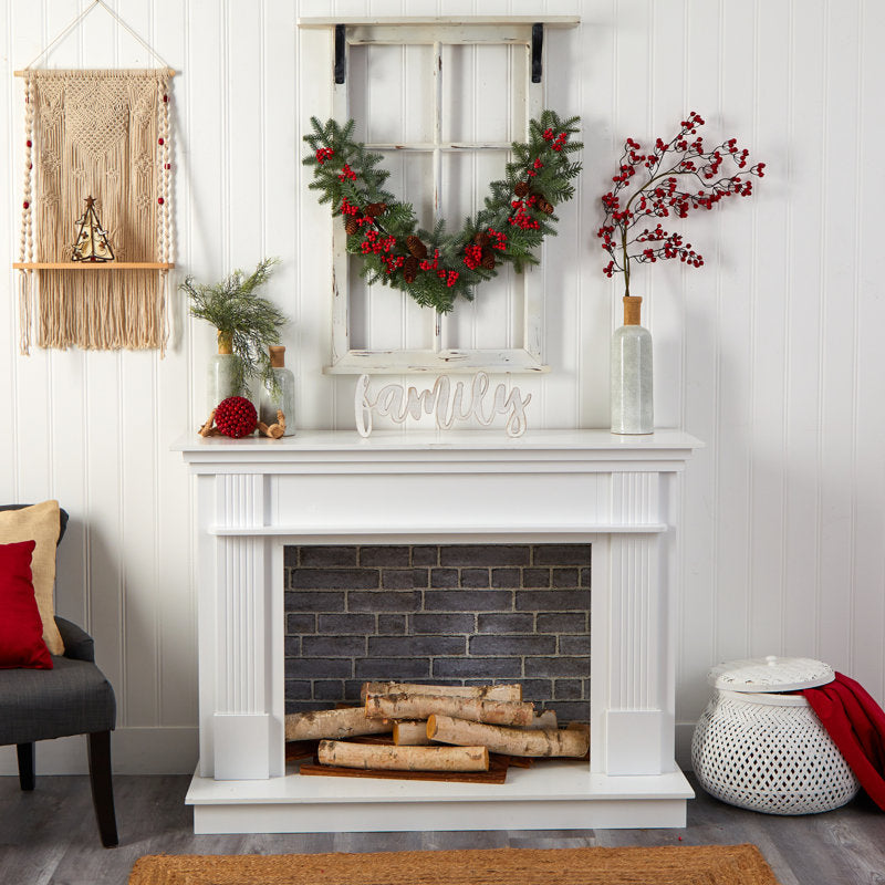9 ft Artificial Fir Christmas Garland draped across a fireplace mantel