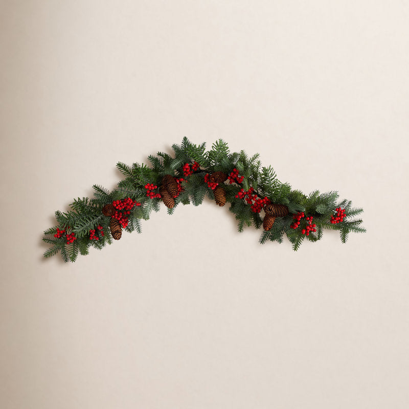 9 ft Artificial Fir Christmas Garland draped across a fireplace mantel