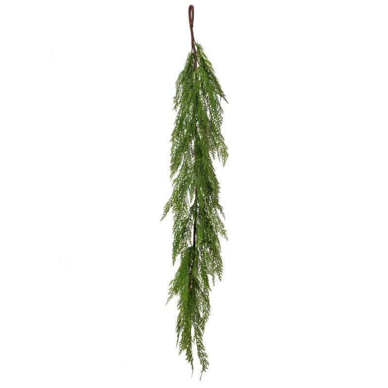6 ft Red Artificial Berry Christmas Garland draped across a fireplace mantel