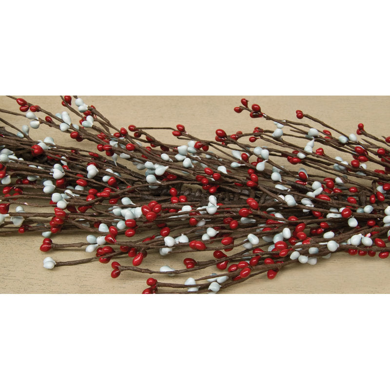 6 ft Real Touch Artificial Cedar Christmas Garland wrapped around a staircase banister
