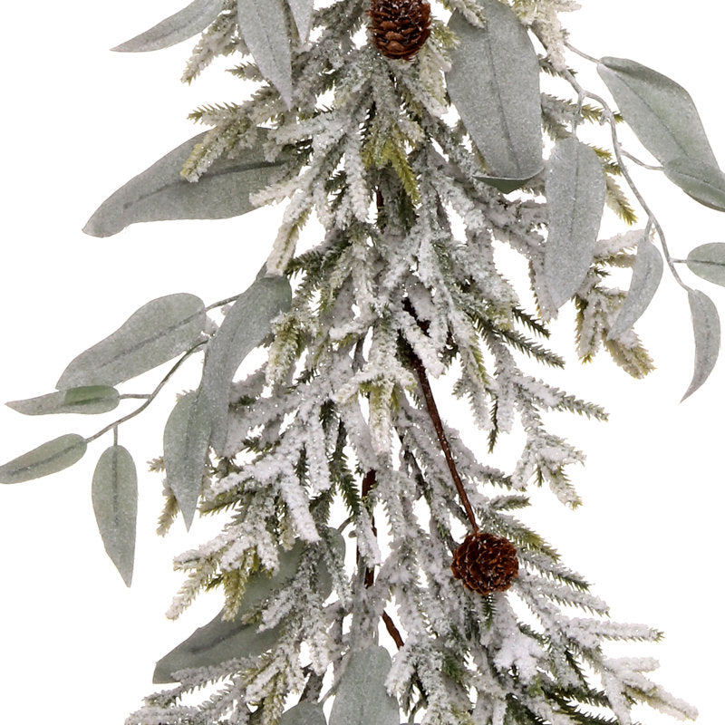 4 ft Rustic Bell Christmas Garland draped across a fireplace mantel