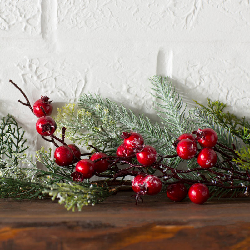 Artificial Christmas Garland styled along a festive mantel