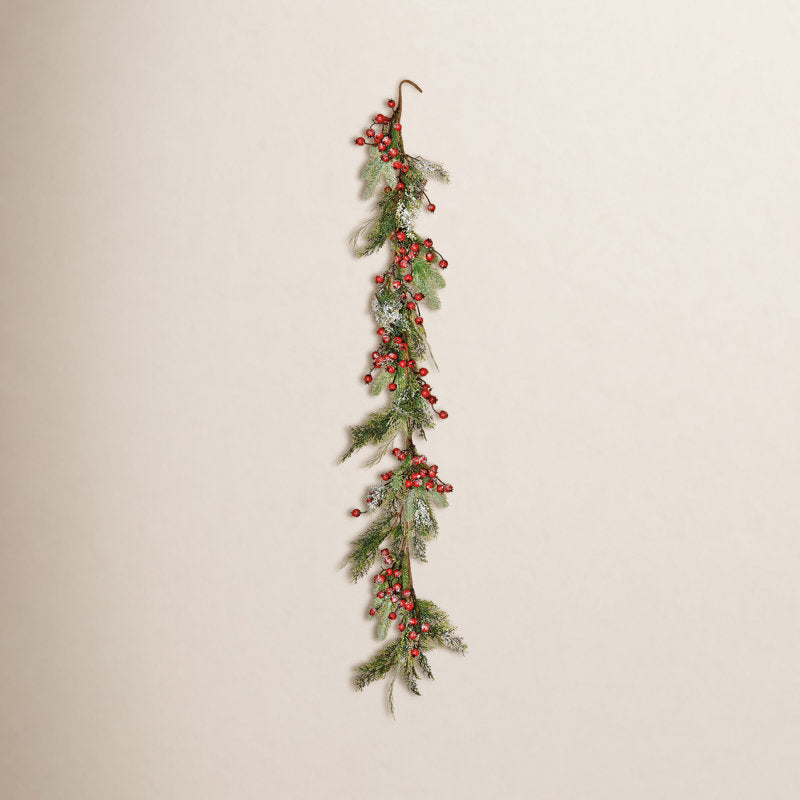 Artificial Christmas Garland styled along a festive mantel