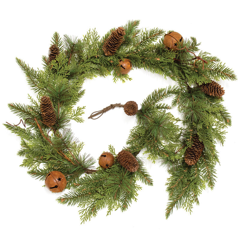 4 ft Magnolia Christmas Garland styled along a festive mantel