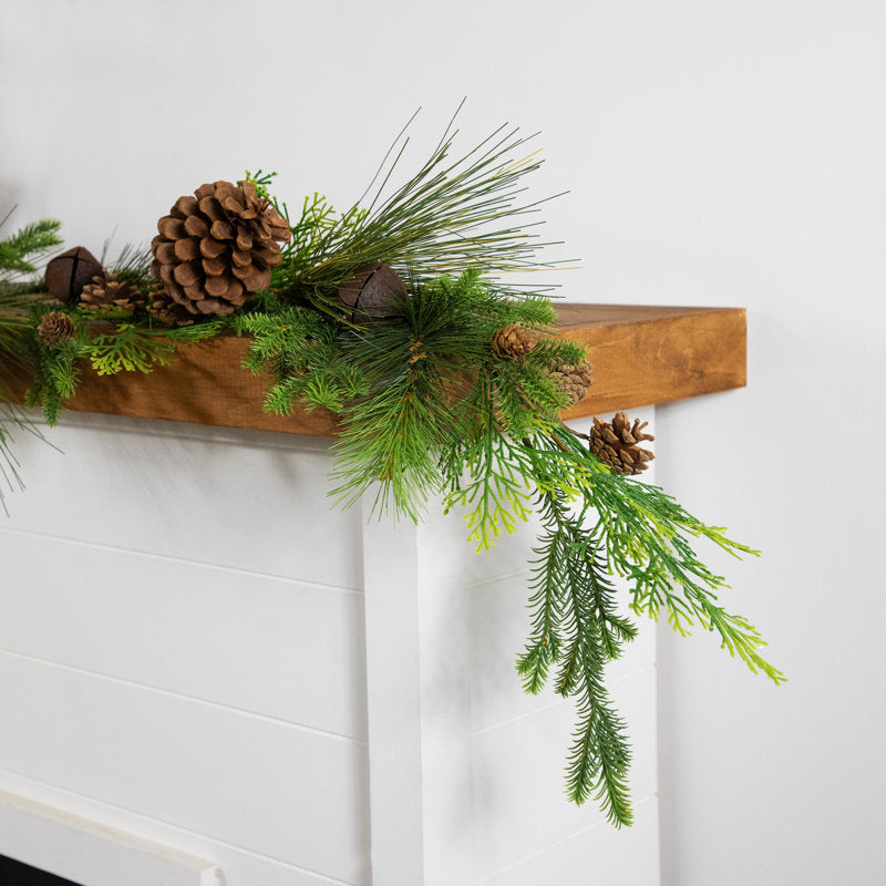 6 ft Artificial Christmas Garland wrapped around a staircase banister