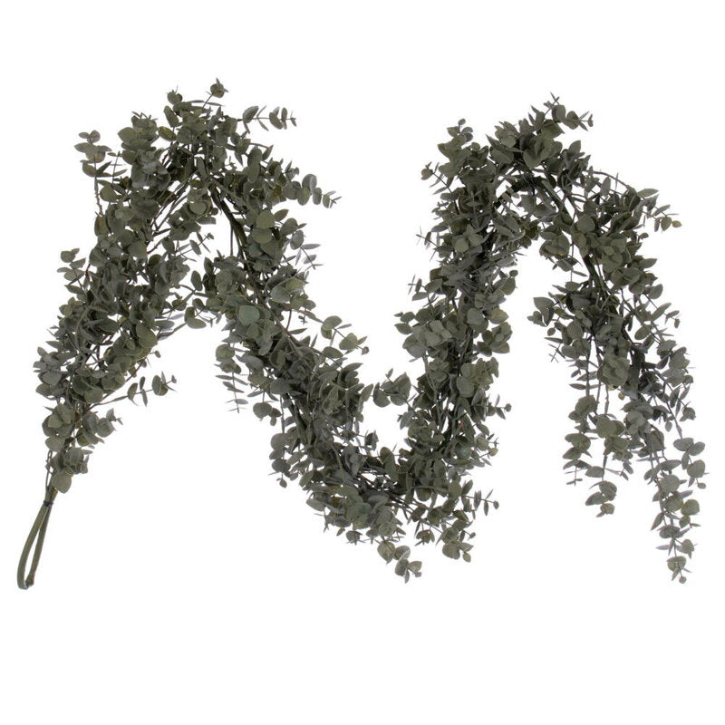 5 ft Snowy Artificial Pine Christmas Garland draped across a fireplace mantel