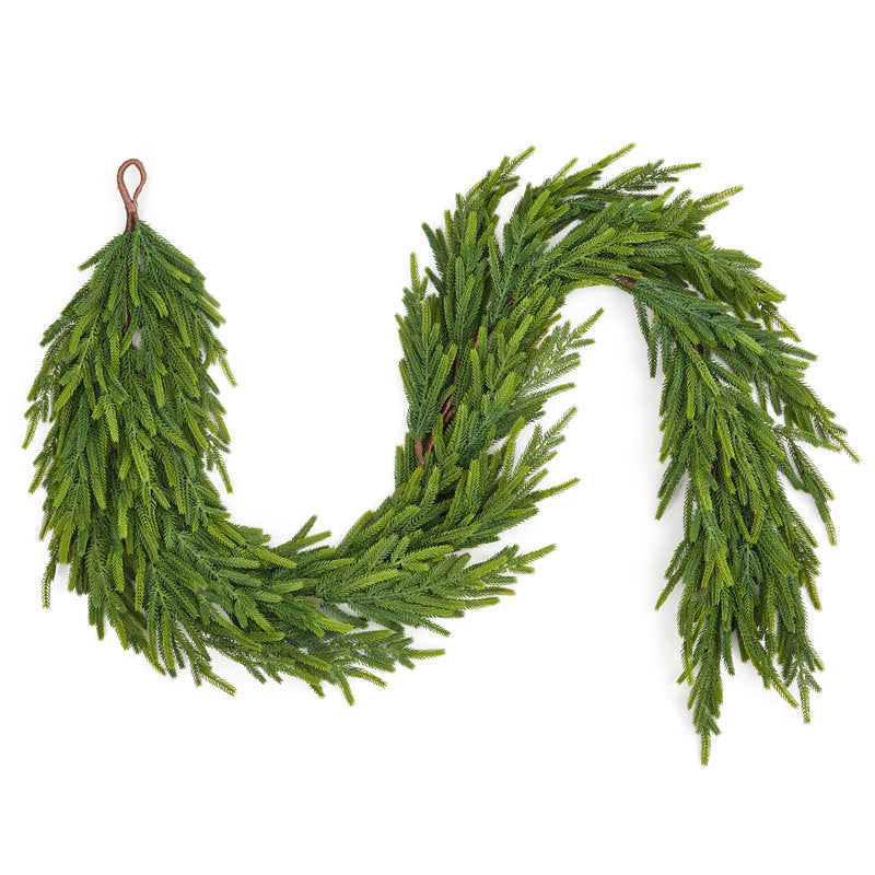 6 ft Pre-Lit Pine Christmas Garland styled along a festive mantel