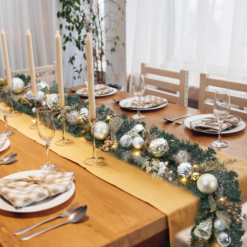 9 ft Pre-Lit Artificial Christmas Garland draped across a fireplace mantel