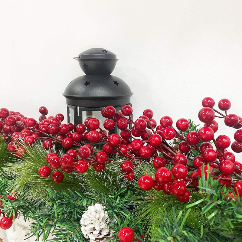 9 ft Pre-Lit Christmas Garland styled along a festive mantel