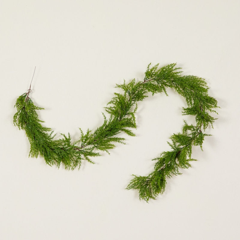 9 ft Artificial Pine Christmas Garland framing a front doorway