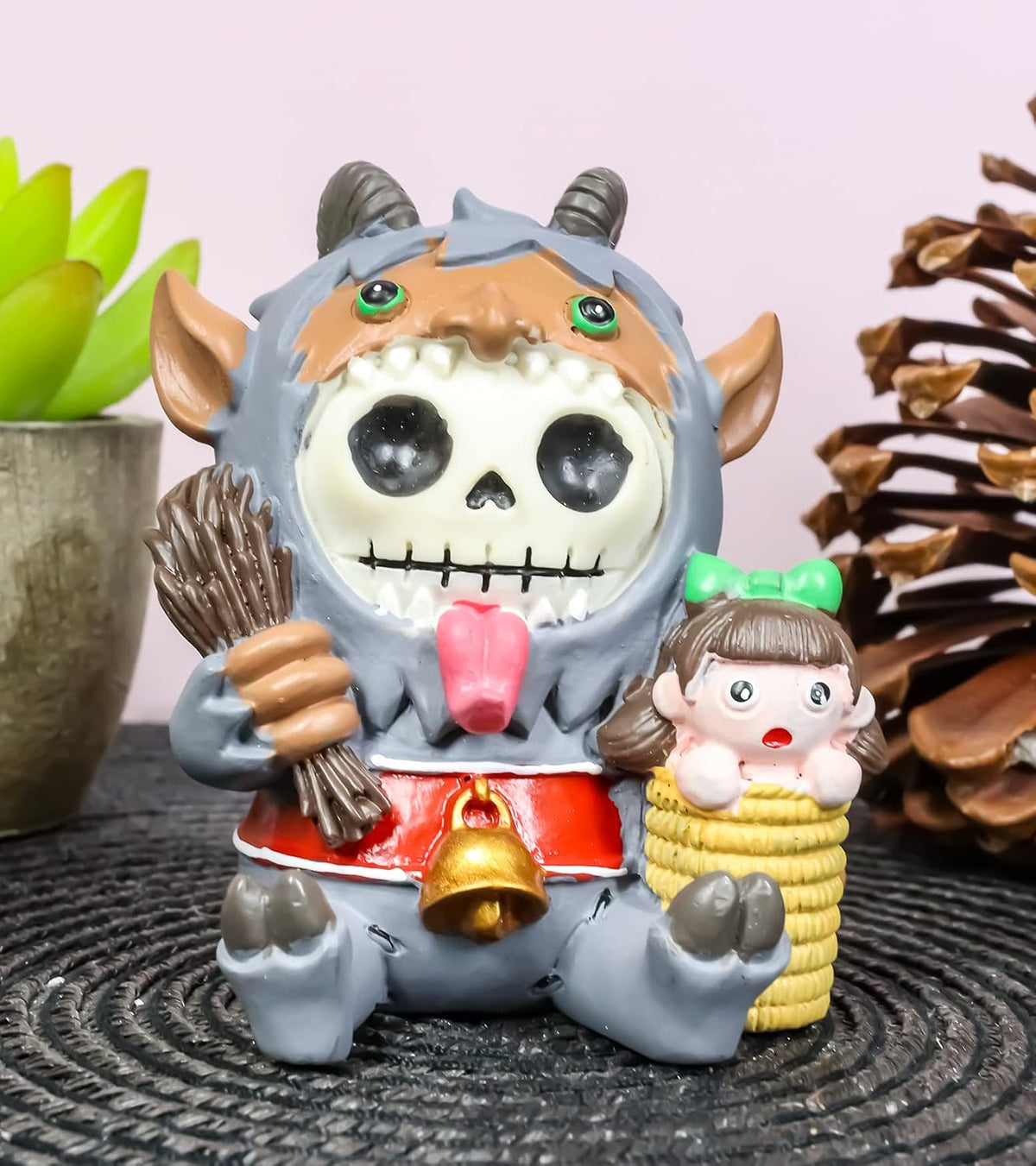 Ebros Gift Furrybones Christmas Terror Hunchback Krampus Skeleton with Naughty Child Figurine Furry Bones Skulls Skeletons Halloween Sculpture