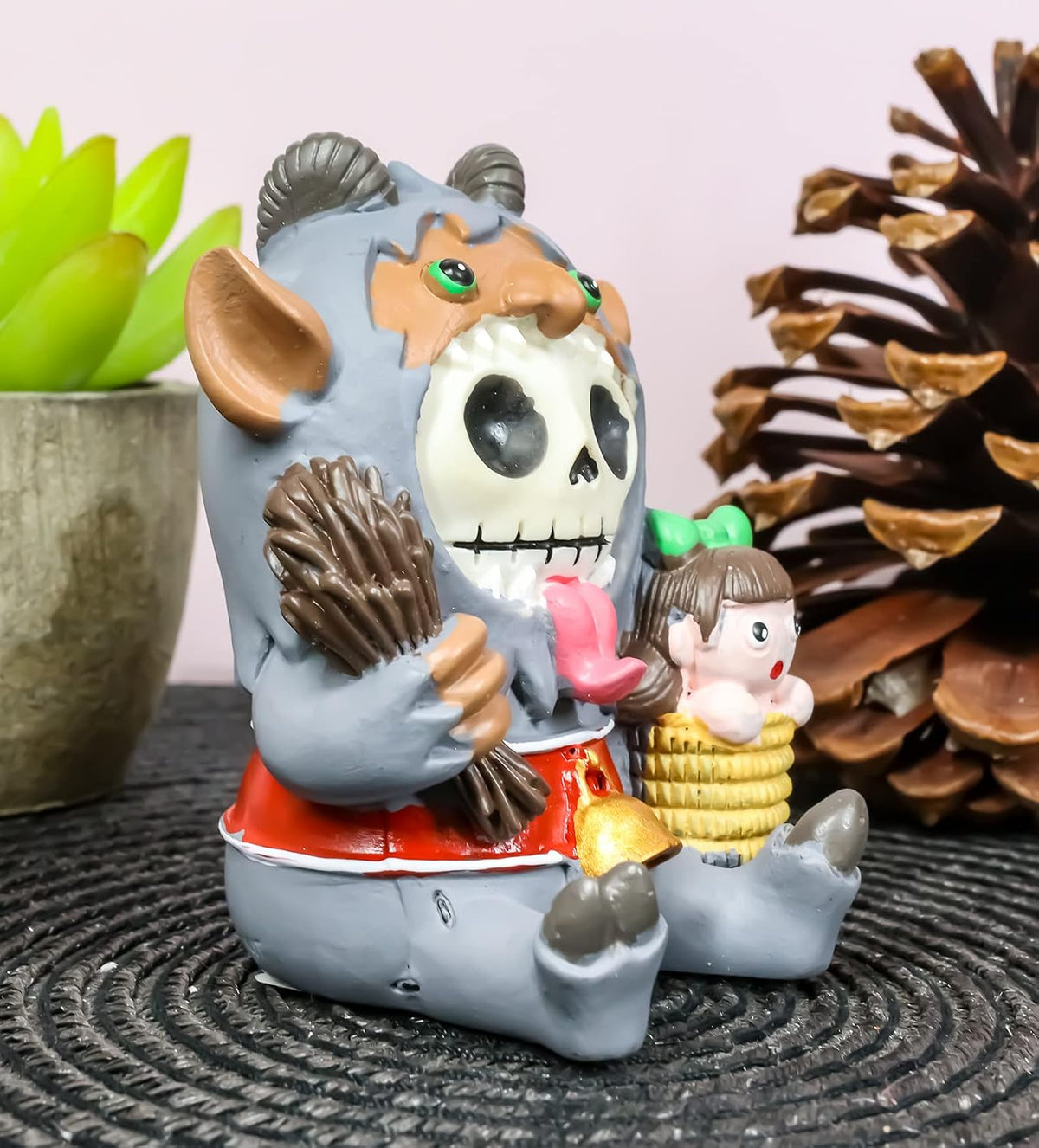 Ebros Gift Furrybones Christmas Terror Hunchback Krampus Skeleton with Naughty Child Figurine Furry Bones Skulls Skeletons Halloween Sculpture