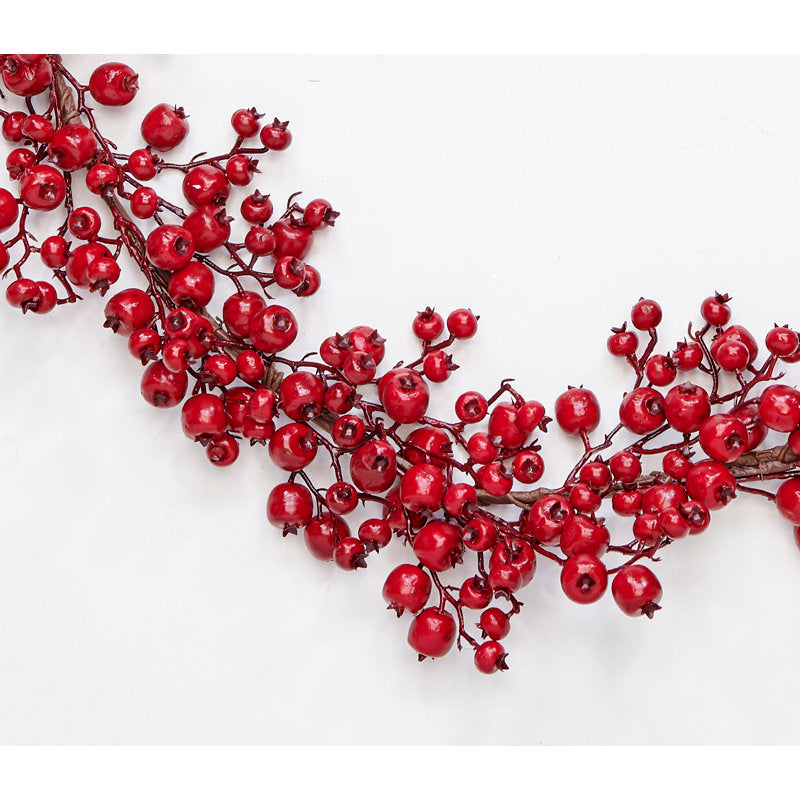 6 ft Pre-Lit Snowy Cedar Christmas Garland wrapped around a staircase banister