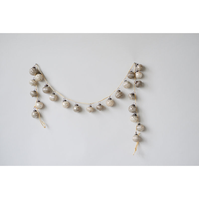 4 ft Artificial Christmas Garland framing a front doorway