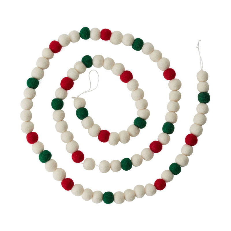 5.9 ft Artificial Berry Christmas Garland styled along a festive mantel