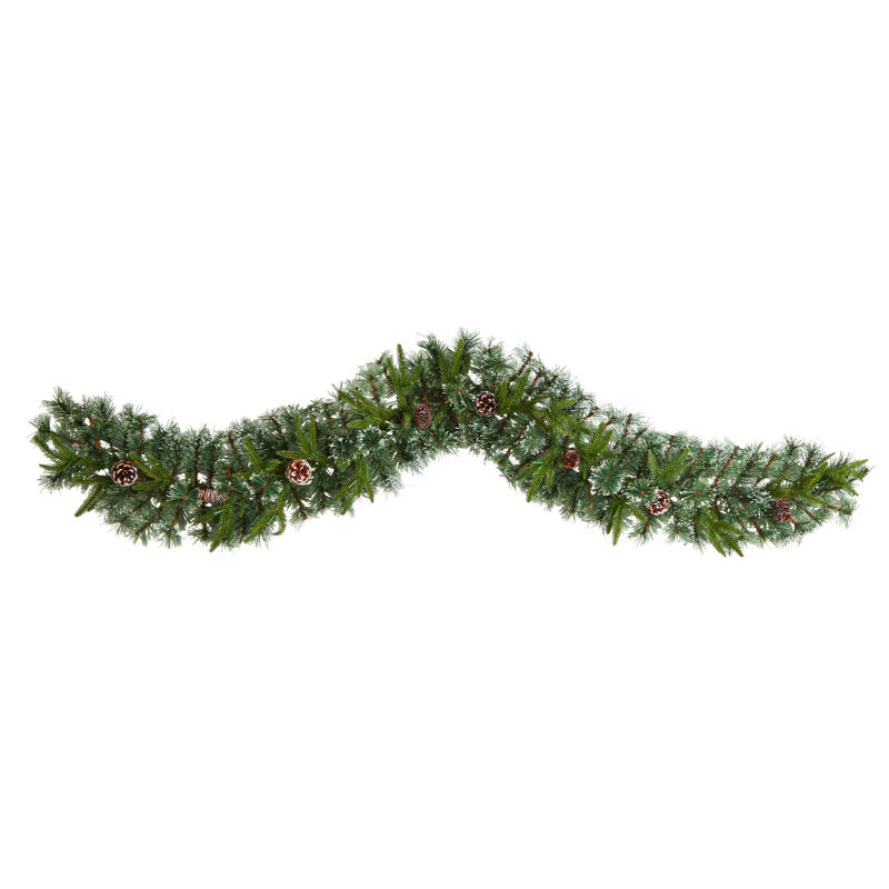Set of 4 Snowy Artificial Norfolk Pine Christmas Wreath hanging on a kitchen cabinet