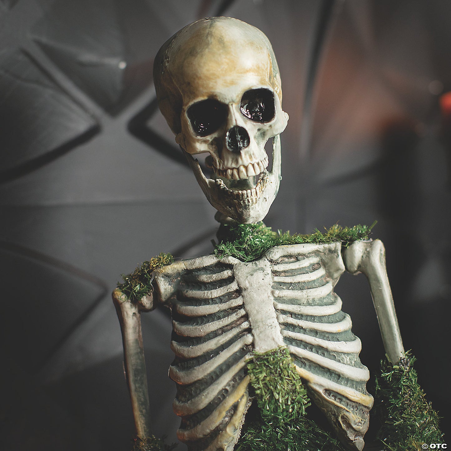 9 3/4" x 14 3/4" Mossy Skeleton Tabletop Animated Prop Halloween Decoration | USA Decoration®