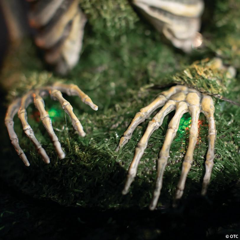 9 3/4" x 14 3/4" Mossy Skeleton Tabletop Animated Prop Halloween Decoration