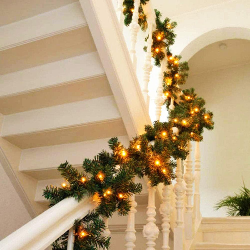 4 ft Glittered Pine Christmas Garland draped across a fireplace mantel