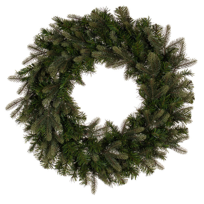 Christmas Wreath hung on a wooden door