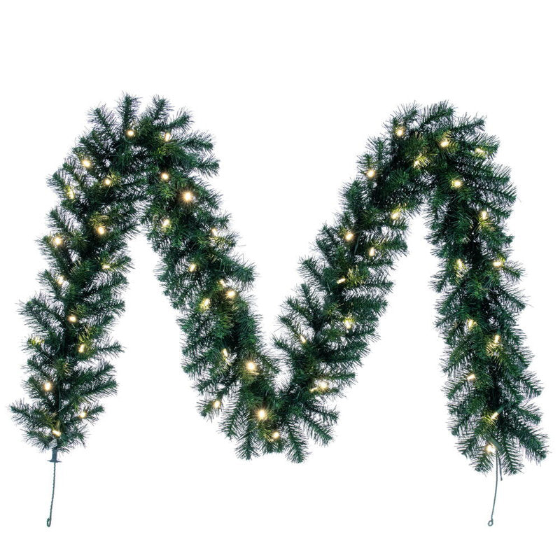6 ft Christmas Garland wrapped around a staircase banister