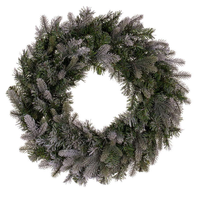 Frosted Artificial Fir Christmas Wreath hung on a wooden door