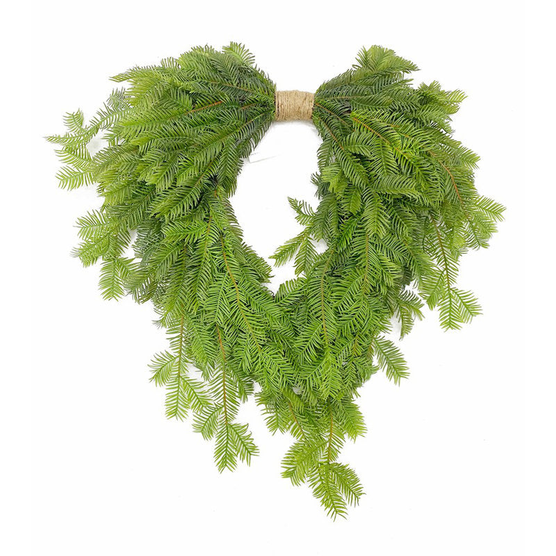 Farmhouse Artificial Christmas Wreath hung on a wooden door