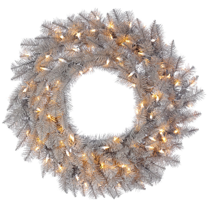 Artificial Fir Christmas Wreath hung on a wooden door
