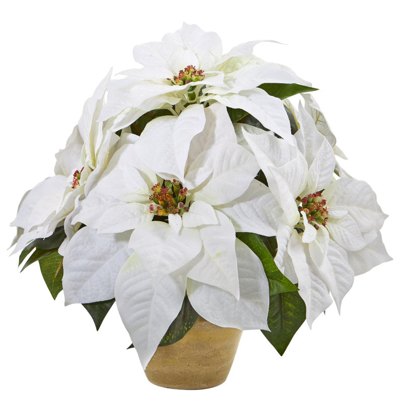 Artificial poinsettia floral arrangement in a vase