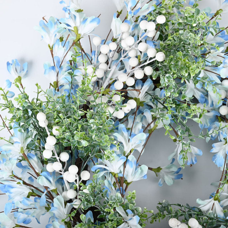 18" Farmhouse Artificial Eucalyptus Christmas Wreath hanging on a front door