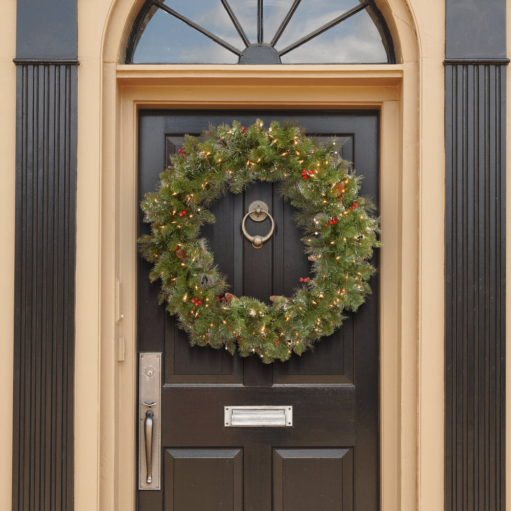 36 in Pre-Lit Crestwood Spruce Wreath with Red Berries Pine Cones Clear Lights | USA Decoration®