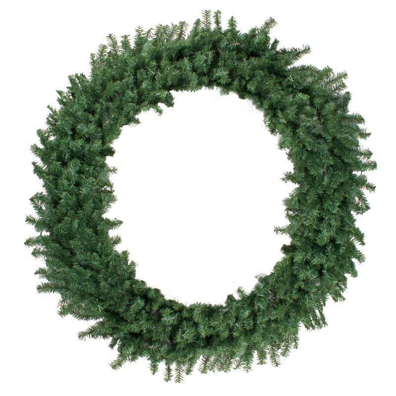 Artificial Pine Christmas Wreath hung on a wooden door